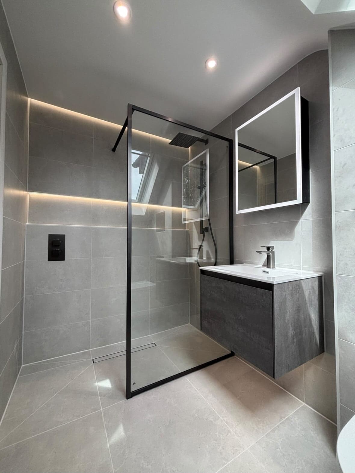 Bathroom project photo showing finished tiling and fitted bathroom details