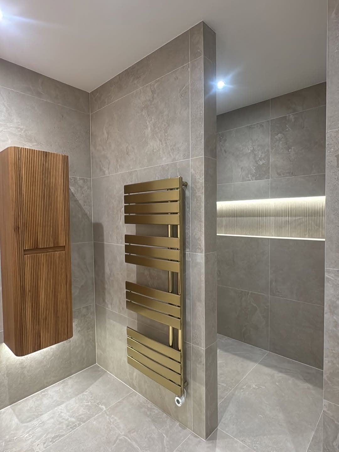 Premium bathroom installation detail with clean lines and coordinated fixtures