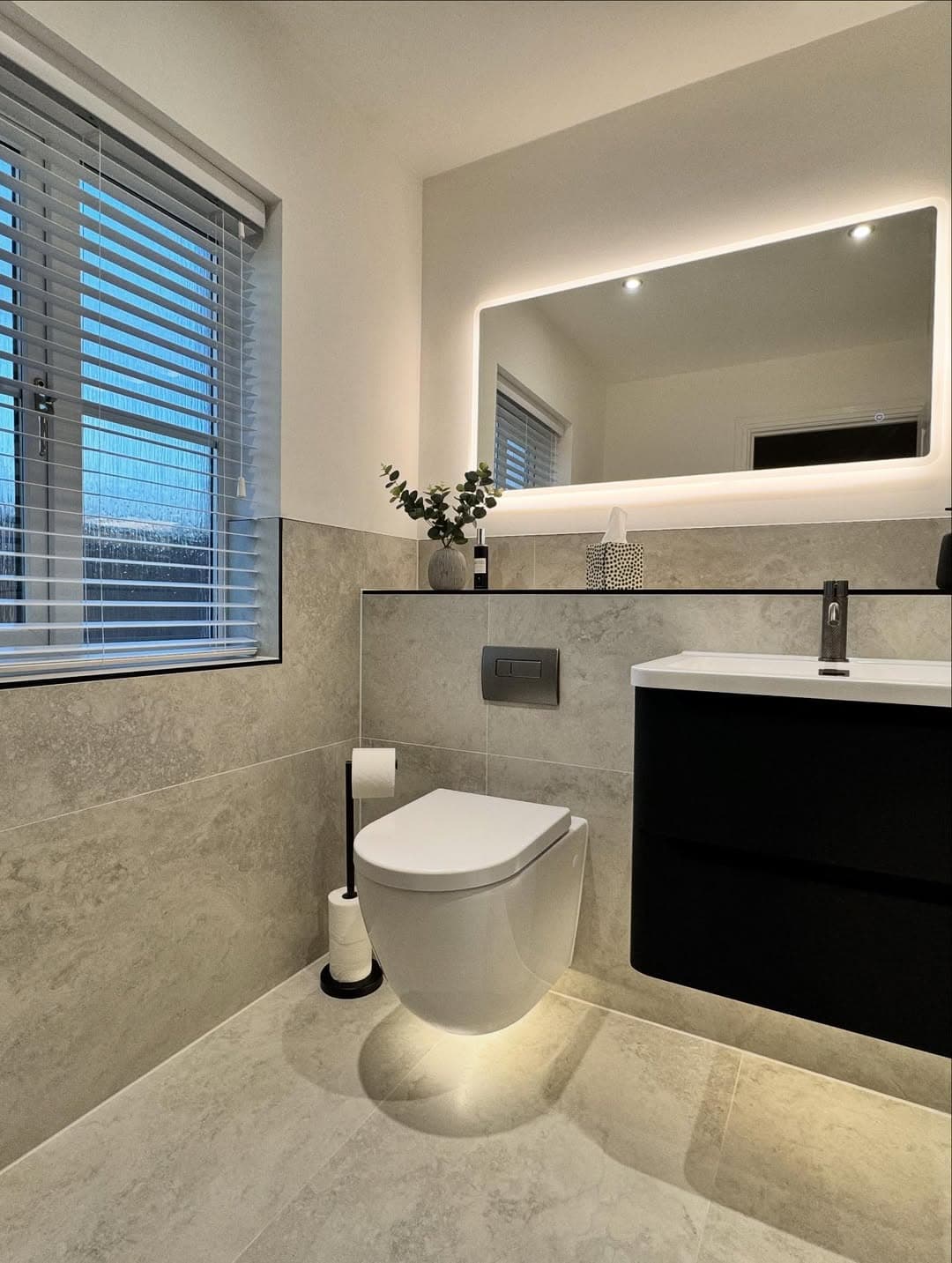 Bathroom renovation with carefully finished surfaces and fitted details