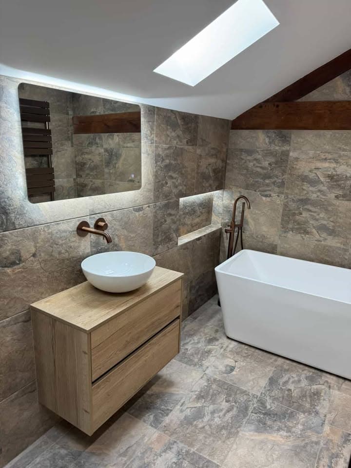 Bathroom project detail showing practical fitted finish and clean surfaces