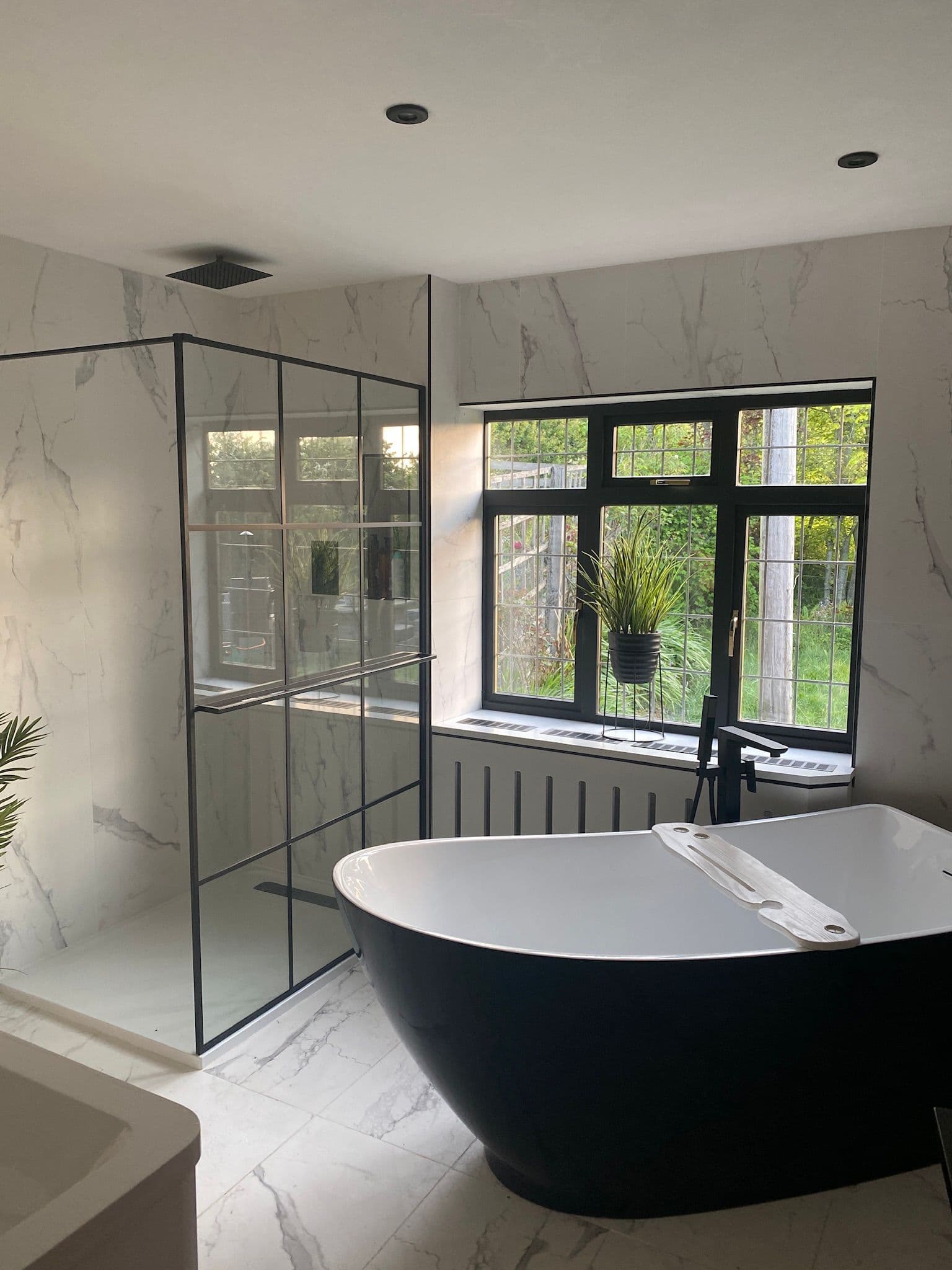 Premium bathroom photo showing a complete fitted finish with modern details