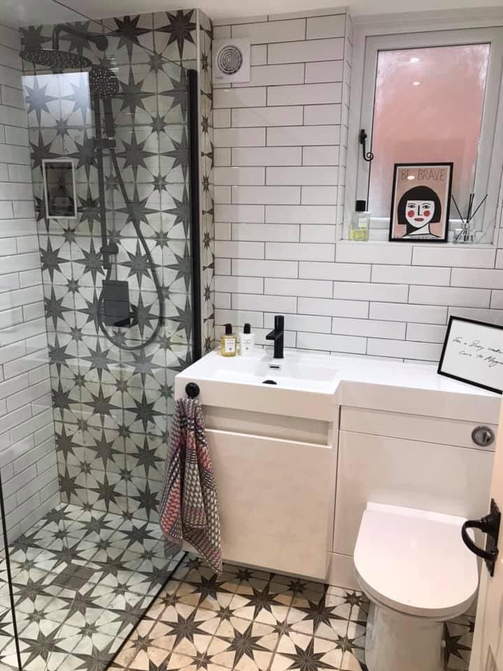 Bathroom installation photo showing clean tiling and finished bathroom detail