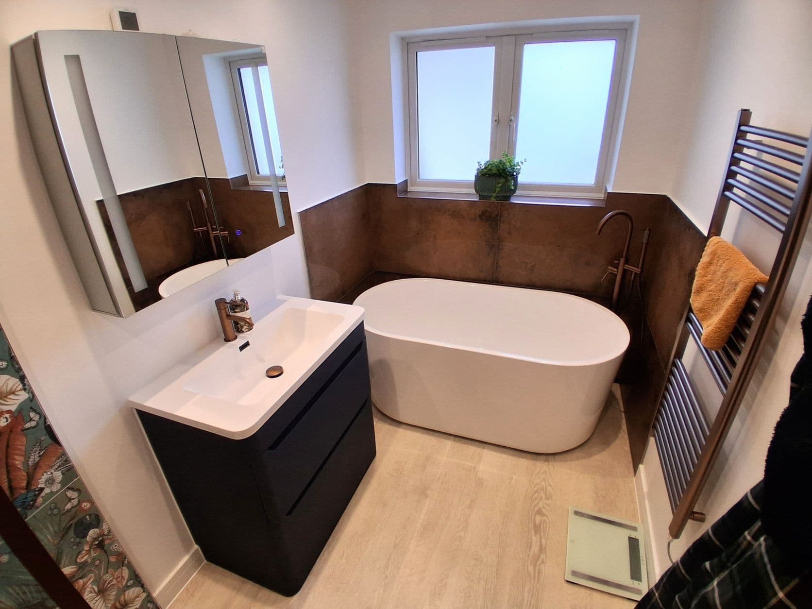 Landscape bathroom photo showing finished layout and premium bathroom details